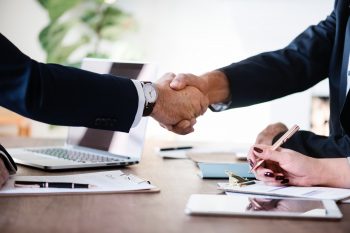 A handshake between two businessmen